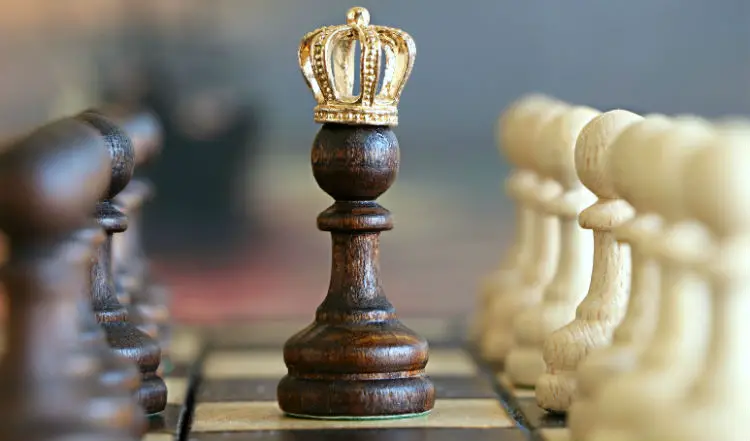A Chess Pawn With A Crown