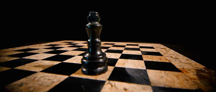 A Chess Piece On A Chess Board