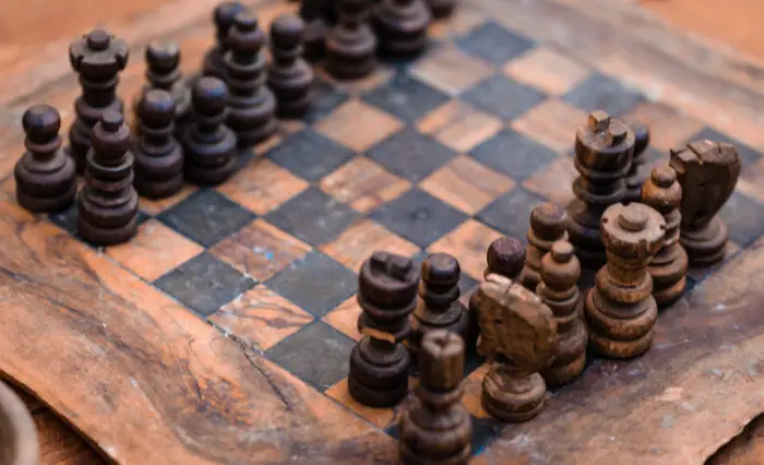 An Antique Chess Set Made of Wood