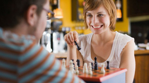 Two Adults Playing Chess