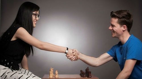 Shaking hands before a chess match