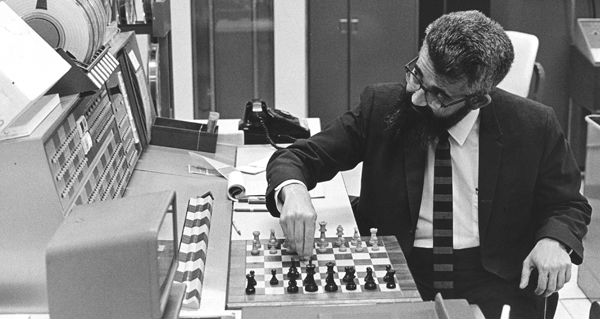 John McCarthy playing chess against computer