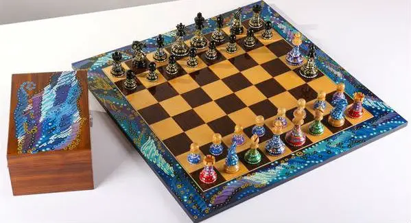 Sydney Gruber's painted chessmen, board, and box.